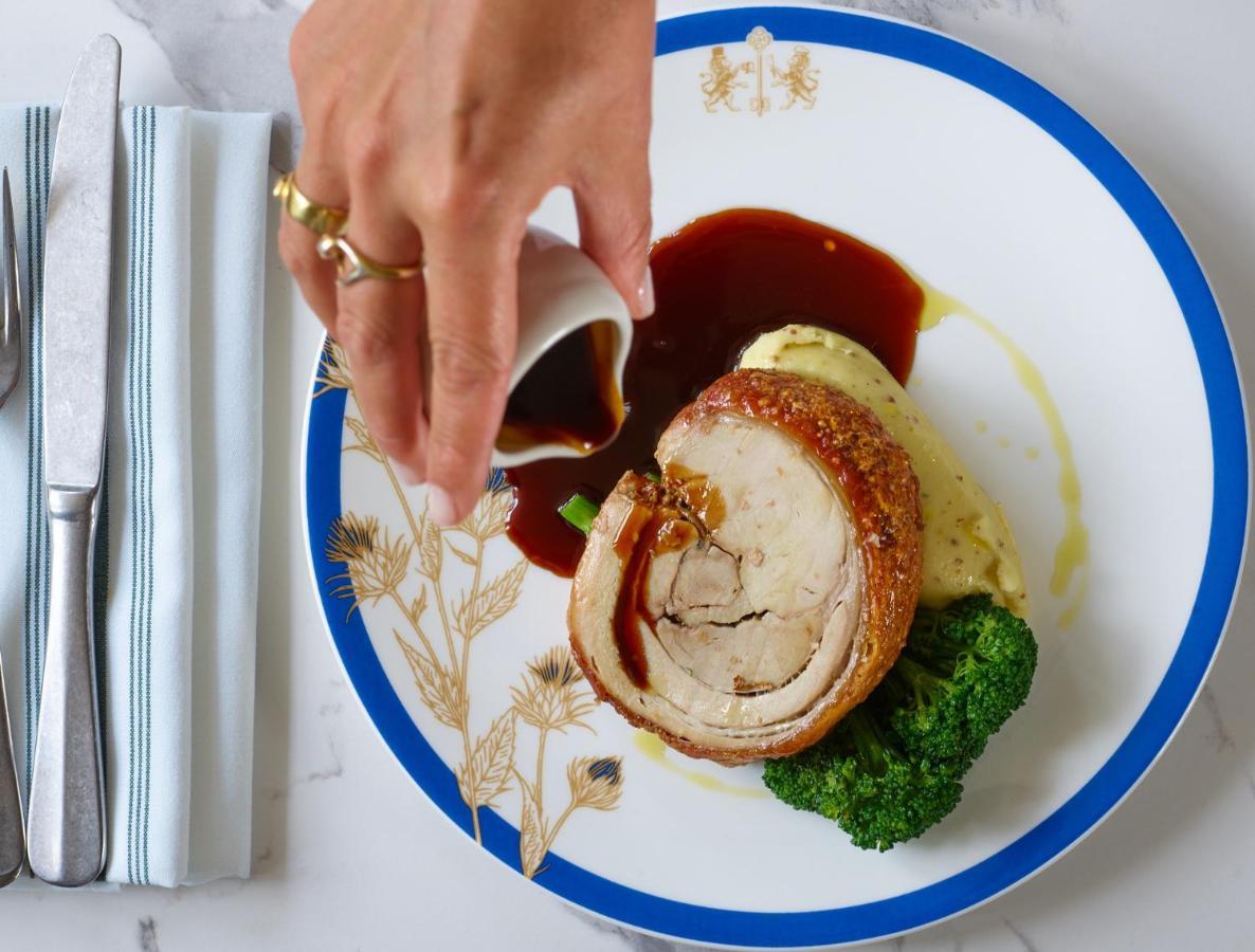 Hotel The Mitre, Hampton Court Kingston upon Thames  Exteriér fotografie A pork tenderloin being served
